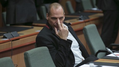 Greek Finance Minister Varoufakis waits for the start of an extraordinary euro zone Finance Ministers meeting to discuss Athens' plans to reverse austerity measures agreed as part of its bailout in Brussels
